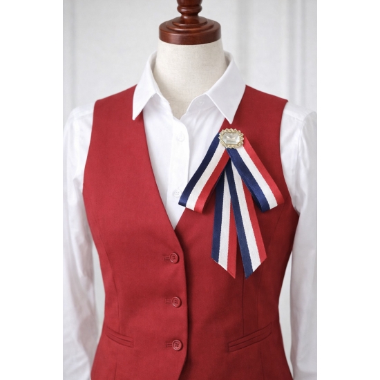 Broszka kokarda wstążkowa – elegancja w klasycznych barwach.